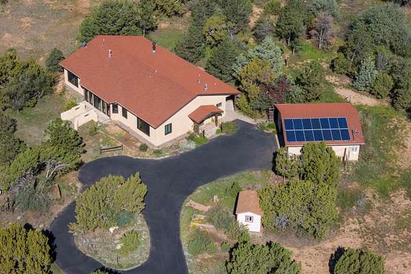 2 Acres of Land with Home for Sale in Sandia Park, New Mexico