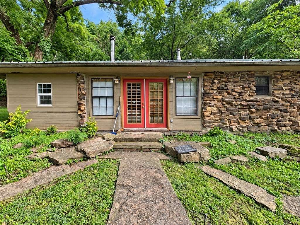 8.24 Acres of Land with Home for Sale in Elkins, Arkansas
