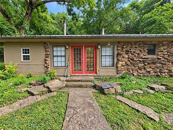 8.24 Acres of Land with Home for Sale in Elkins, Arkansas