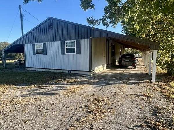18.4 Acres of Land with Home for Sale in Crofton, Kentucky