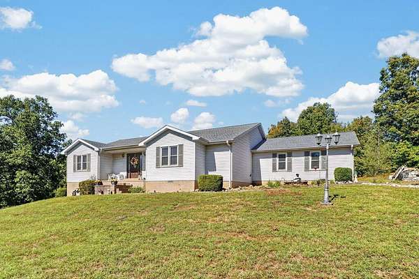 16.4 Acres of Land with Home for Sale in Hanson, Kentucky