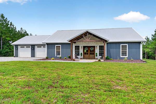 5 Acres of Land with Home for Sale in Erin, Tennessee