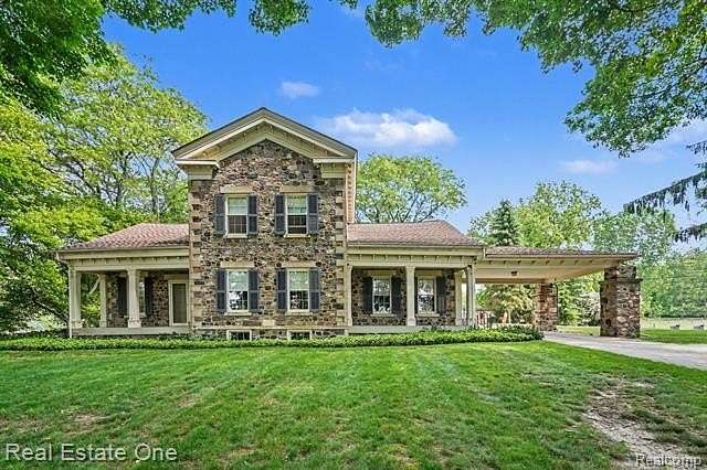 5.9 Acres of Land with Home for Sale in Highland Township, Michigan