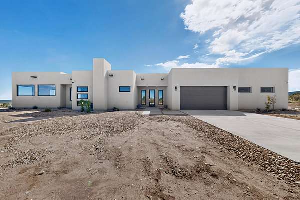 10.6 Acres of Land with Home for Sale in Sandia Park, New Mexico