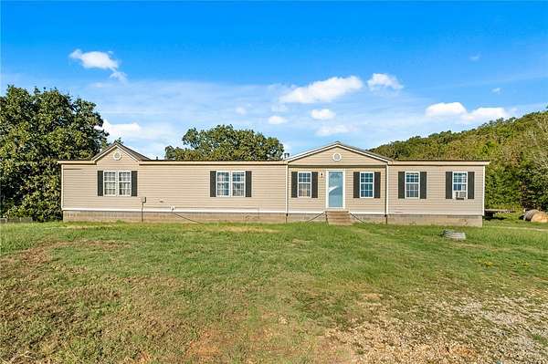 19.2 Acres of Land with Home for Sale in Prairie Grove, Arkansas