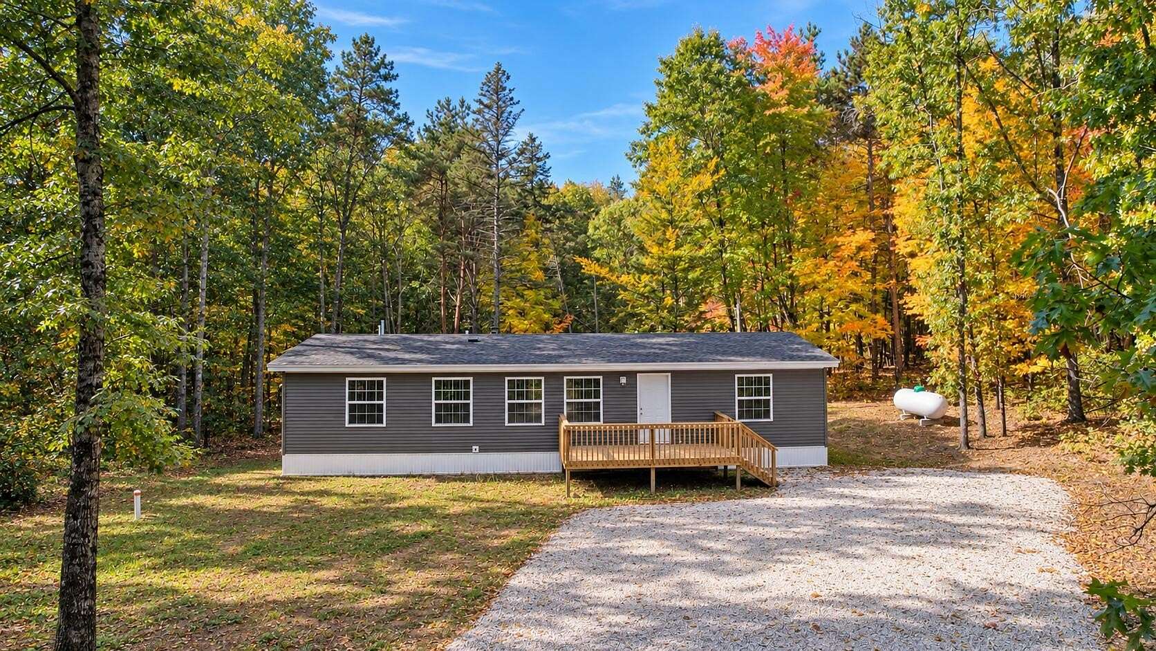 5 Acres of Land with Home for Sale in Howard City, Michigan