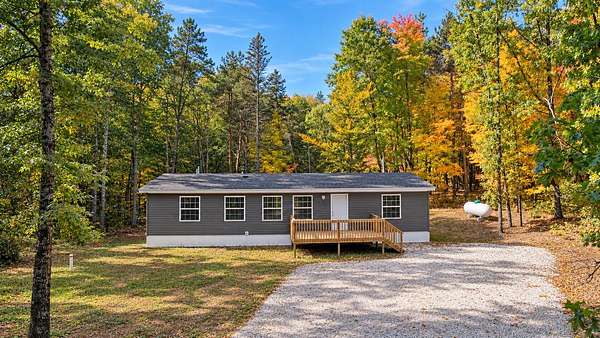 5 Acres of Land with Home for Sale in Howard City, Michigan
