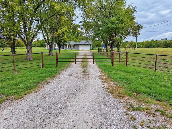 10 Acres of Land with Home for Sale in Carthage, Missouri