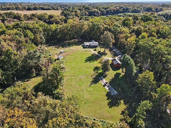 40.2 Acres of Recreational Land with Home for Sale in Lawrence, Michigan