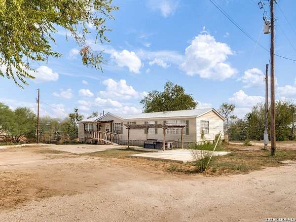 3.68 Acres of Land with Home for Sale in Devine, Texas
