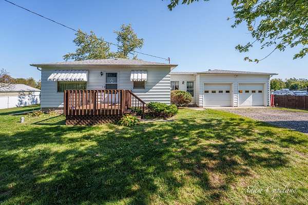 2.43 Acres of Land with Home for Sale in Coopersville, Michigan