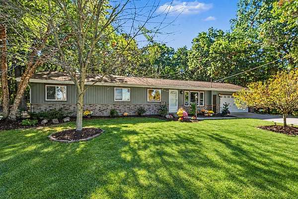 2 Acres of Land with Home for Sale in Rockford, Michigan