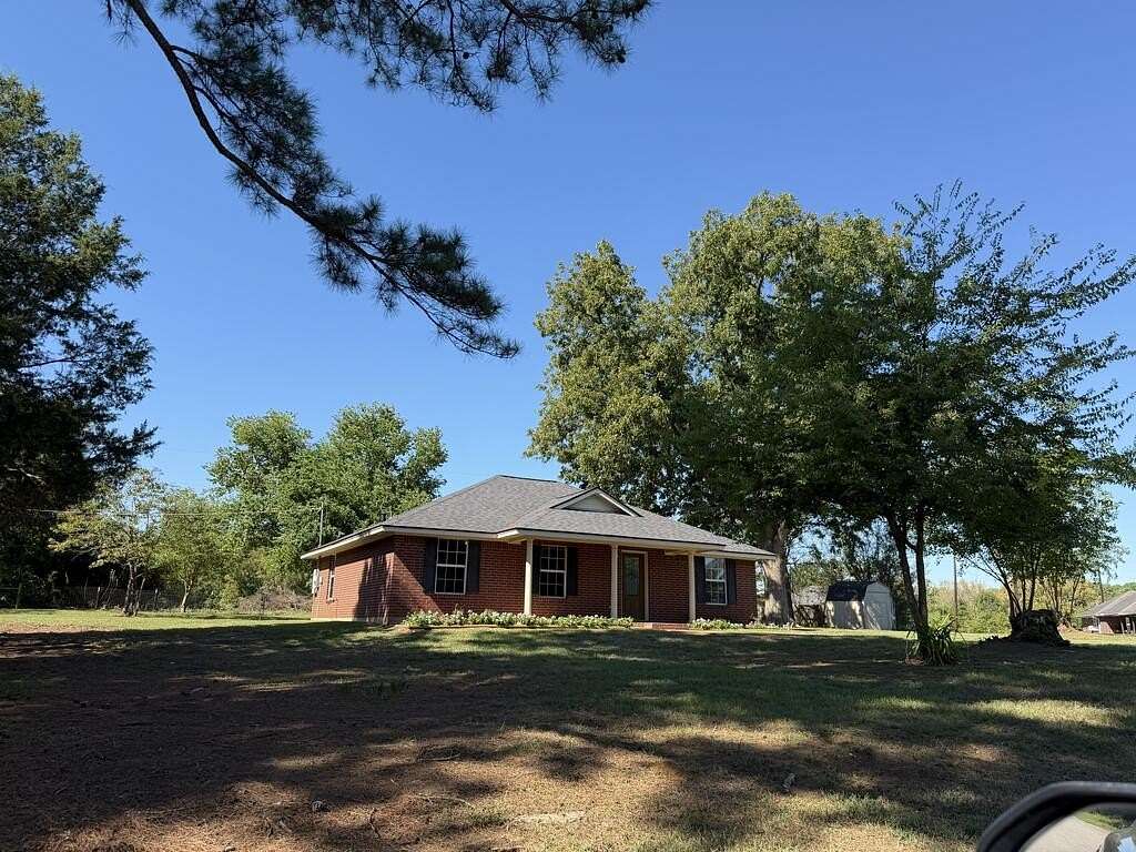 2 Acres of Land with Home for Sale in Elkhart, Texas