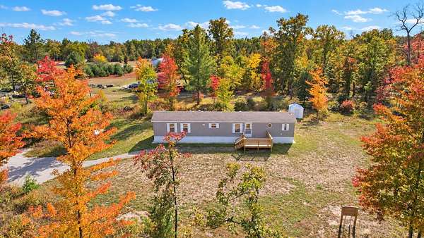 4 Acres of Land with Home for Sale in White Cloud, Michigan