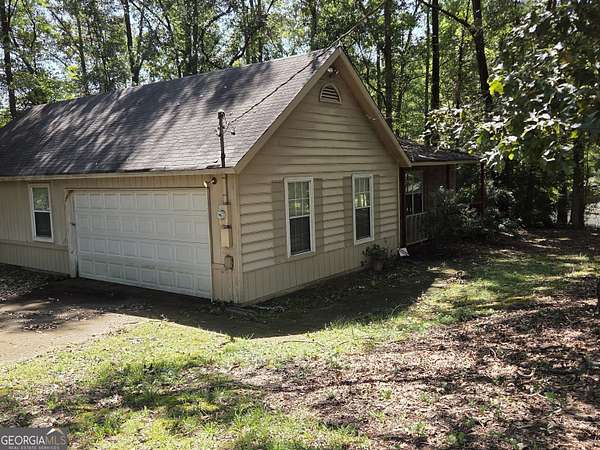 1.75 Acres of Land with Home for Sale in Riverdale, Georgia