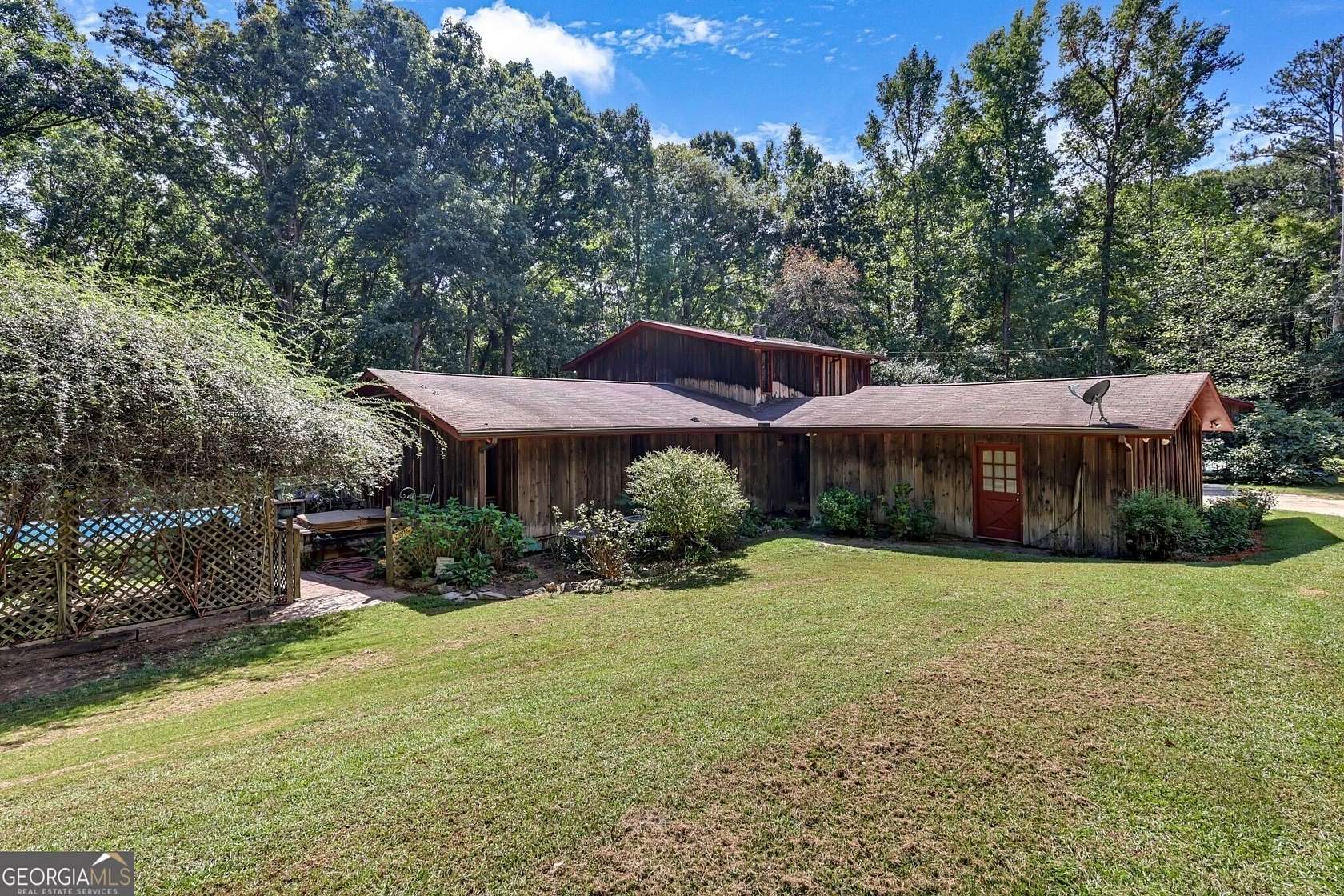 8.12 Acres of Land with Home for Sale in Conyers, Georgia