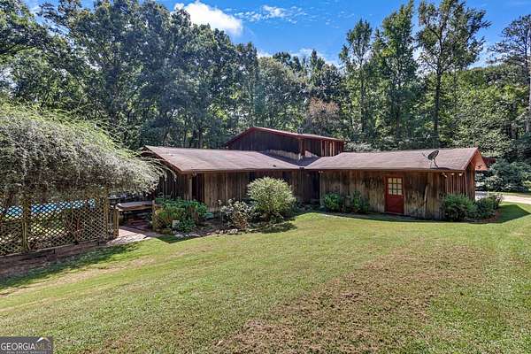 8.12 Acres of Land with Home for Sale in Conyers, Georgia
