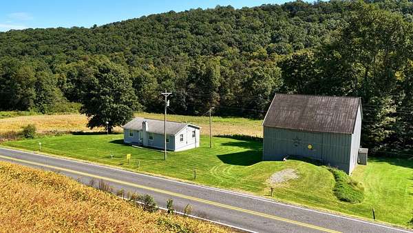 58.7 Acres of Recreational Land with Home for Sale in Honey Grove, Pennsylvania