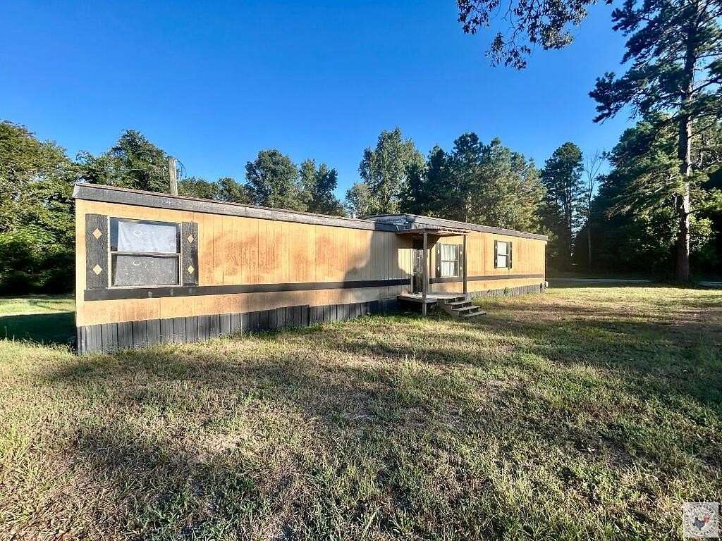 9 Acres of Land with Home for Sale in Atlanta, Texas