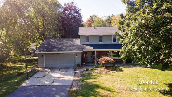 2 Acres of Land with Home for Sale in Allendale, Michigan
