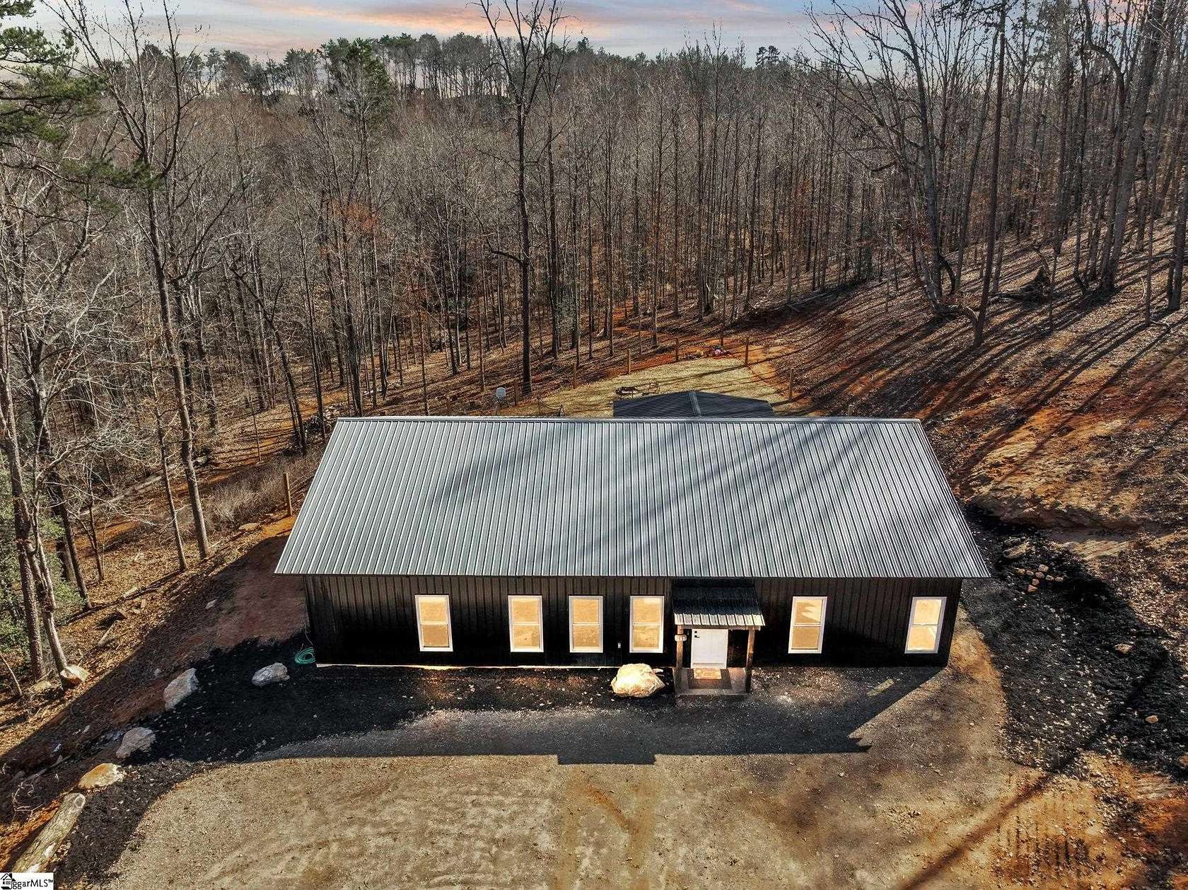 7.8 Acres of Land with Home for Sale in Travelers Rest, South Carolina