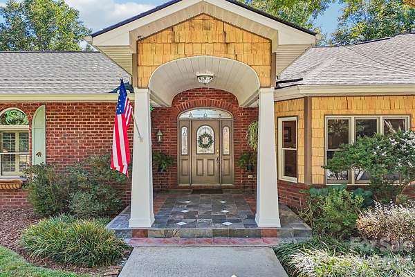 6.77 Acres of Land with Home for Sale in Hendersonville, North Carolina