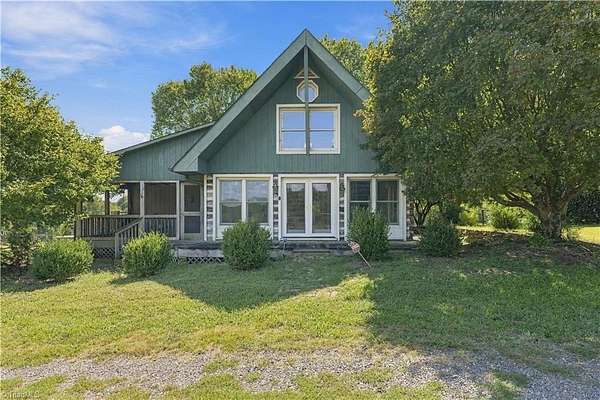7 Acres of Land with Home for Sale in Advance, North Carolina