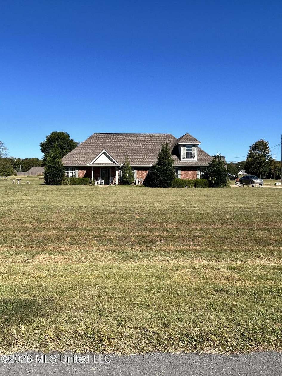 1.5 Acres of Land with Home for Sale in Holly Springs, Mississippi