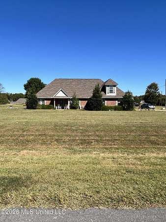 1.5 Acres of Land with Home for Sale in Holly Springs, Mississippi