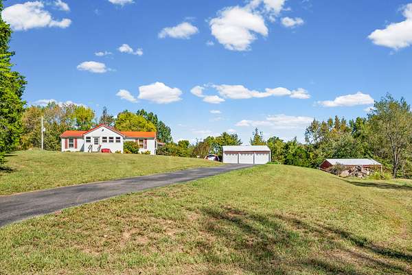11.5 Acres of Land with Home for Sale in Palmyra, Tennessee