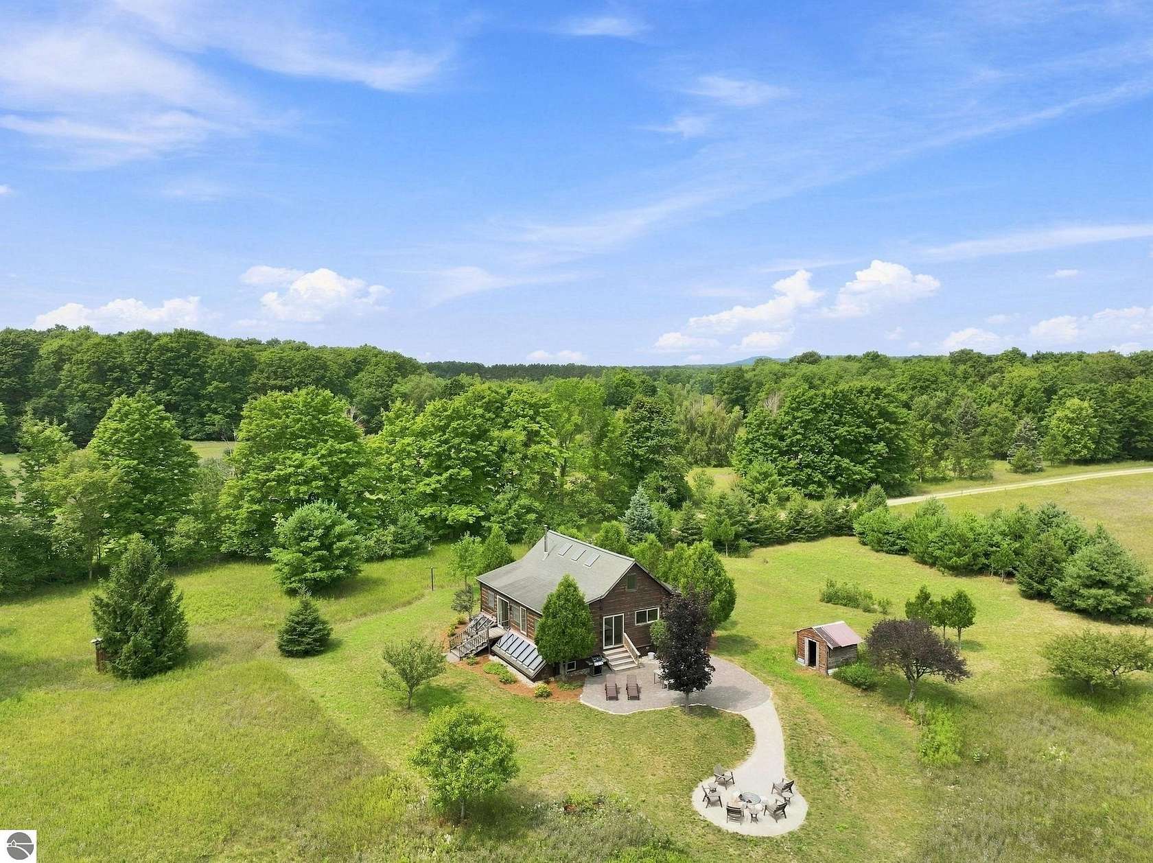 158 Acres of Land with Home for Sale in Honor, Michigan