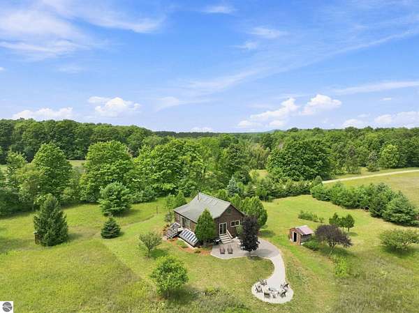 158 Acres of Land with Home for Sale in Honor, Michigan