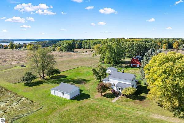 7.5 Acres of Land with Home for Sale in Rapid City, Michigan