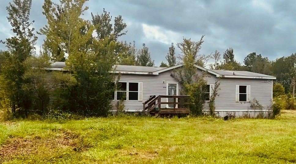 5.28 Acres of Land with Home for Sale in La Crosse, Florida