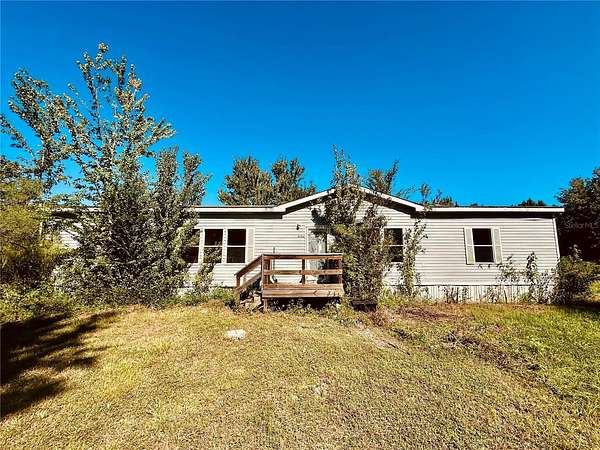 5.28 Acres of Land with Home for Sale in La Crosse, Florida