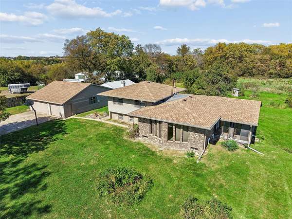 24.4 Acres of Land with Home for Sale in Indianola, Iowa