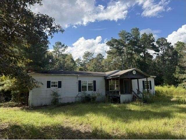 15.8 Acres of Land with Home for Sale in Kirbyville, Texas