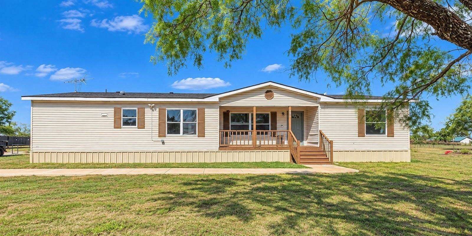 1.78 Acres of Land with Home for Sale in Aquilla, Texas