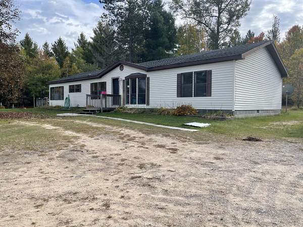 10 Acres of Recreational Land with Home for Sale in Roscommon, Michigan