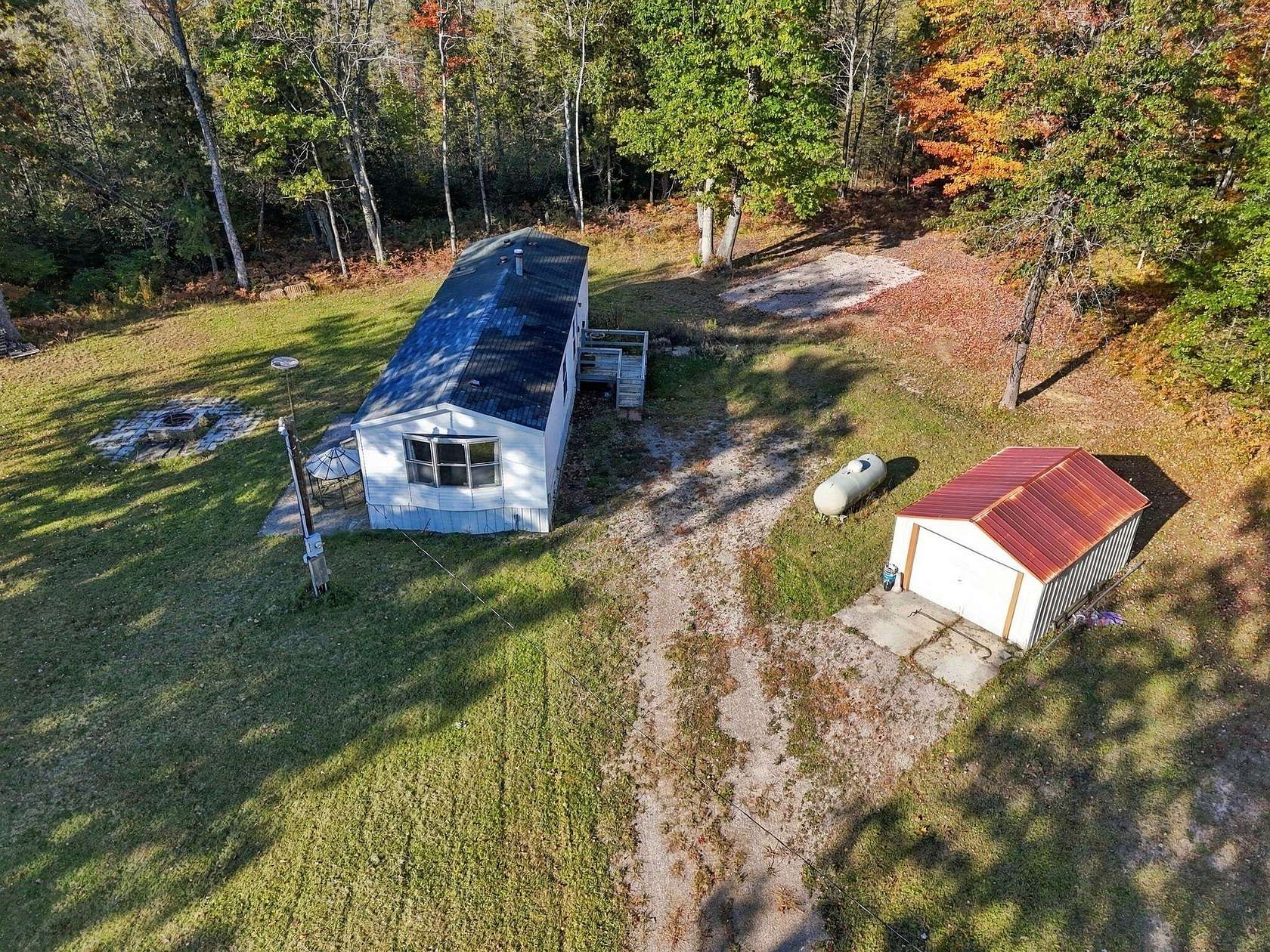 20 Acres of Recreational Land with Home for Sale in Houghton Lake, Michigan