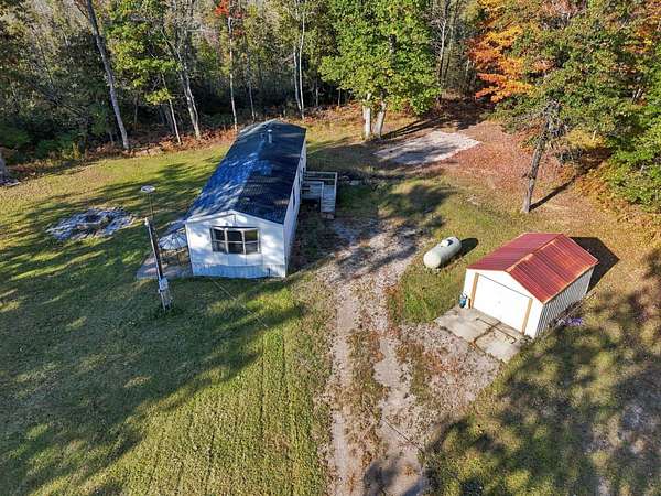 20 Acres of Recreational Land with Home for Sale in Houghton Lake, Michigan