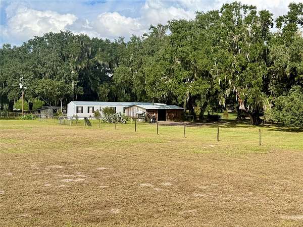 6.88 Acres of Land with Home for Sale in Bushnell, Florida