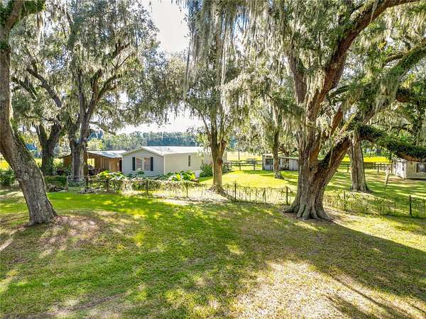 6.88 Acres of Land with Home for Sale in Bushnell, Florida