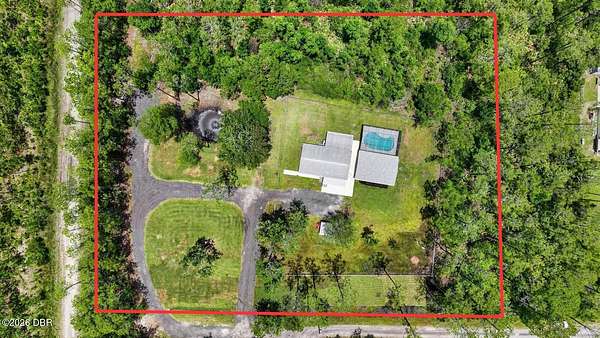 2.35 Acres of Land with Home for Sale in Ormond Beach, Florida