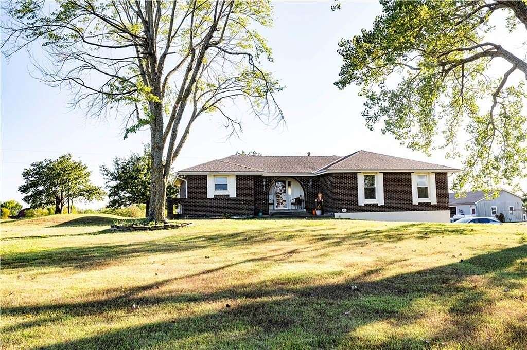 5 Acres of Land with Home for Sale in Peculiar, Missouri