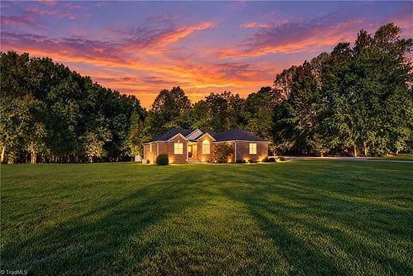 2 Acres of Land with Home for Sale in Oak Ridge, North Carolina