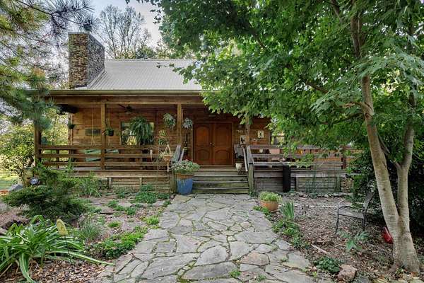 9.8 Acres of Land with Home for Sale in Blountsville, Alabama