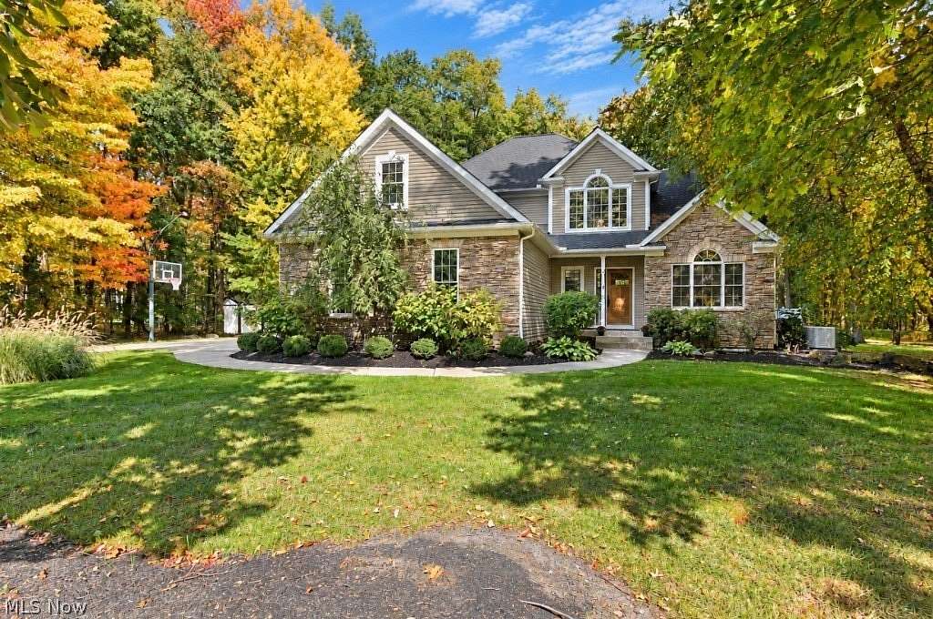 1.66 Acres of Land with Home for Sale in Leroy Township, Ohio