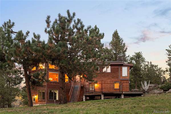 5.8 Acres of Land with Home for Sale in Evergreen, Colorado