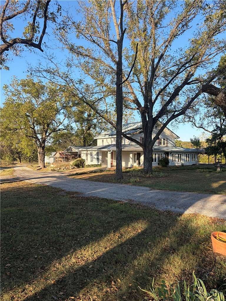 3.1 Acres of Land with Home for Sale in Berryville, Arkansas